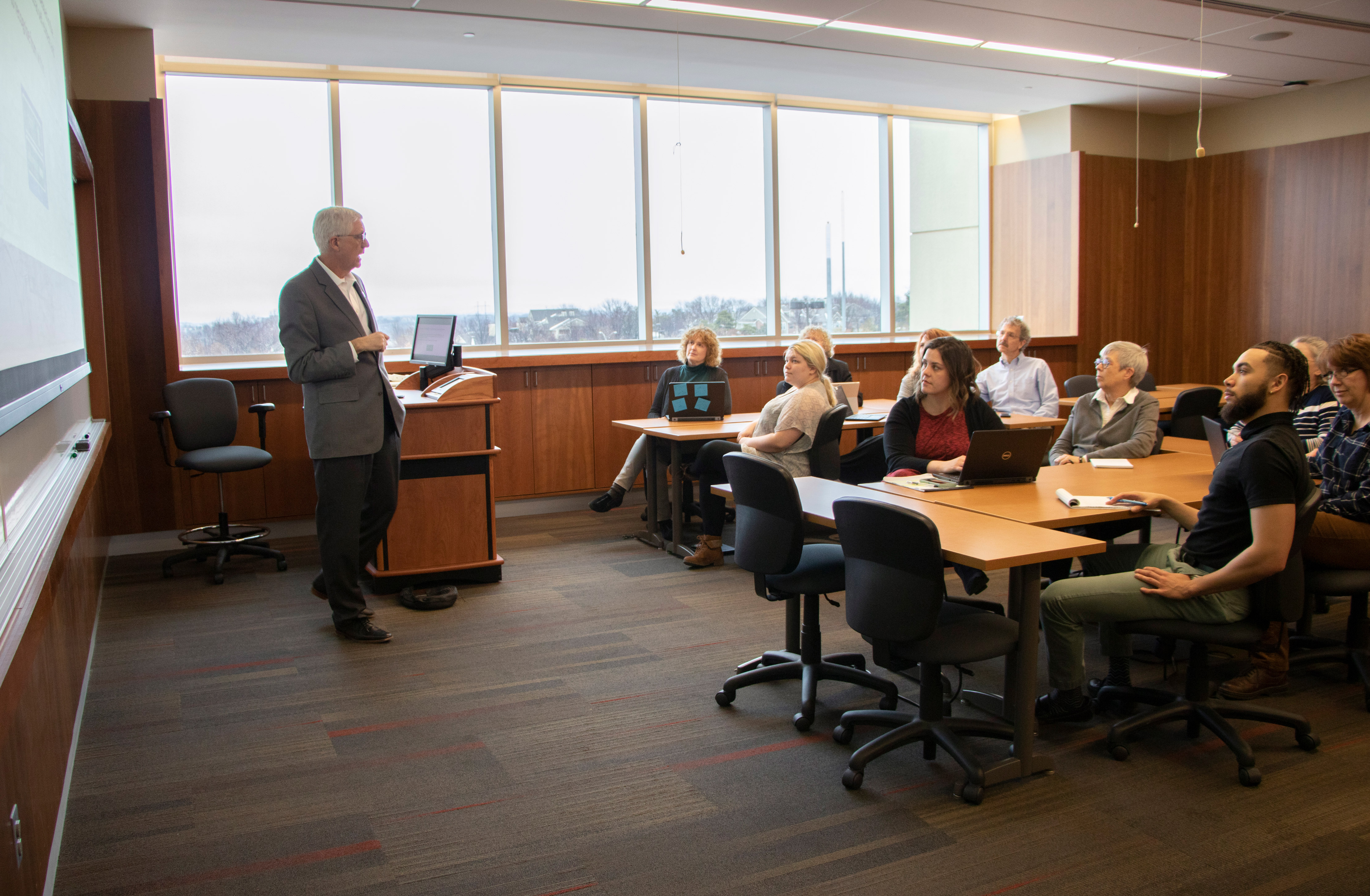 Teacher in front of a classroom of noncredit students