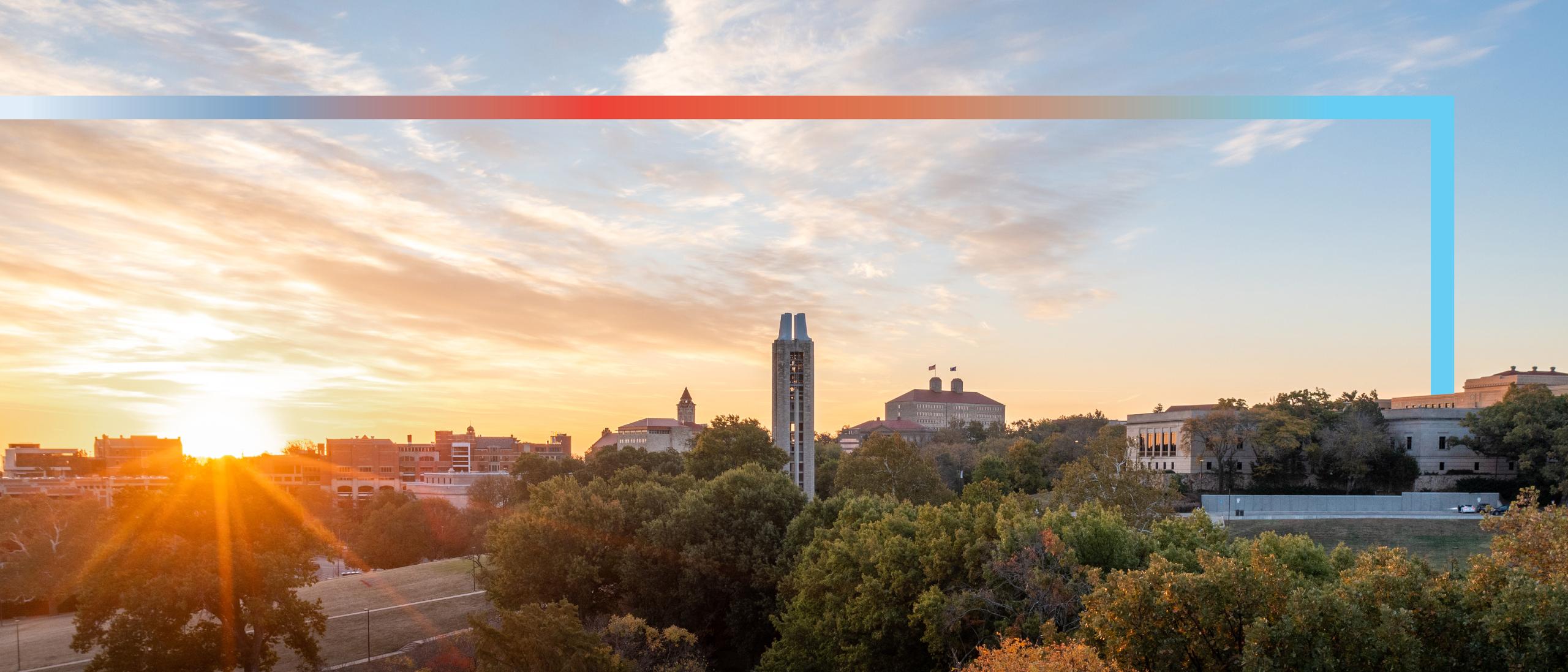 University of Kansas Lawrence Campus arial shot with the Campanile and Fraiser in the center of the picture in the sunrise
