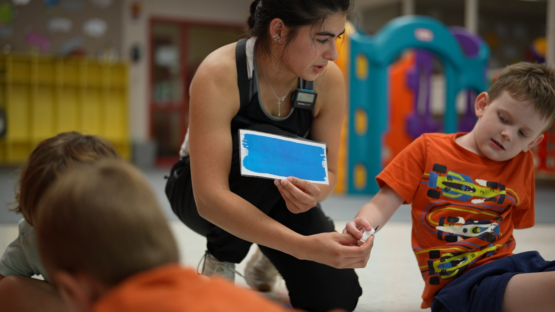 An RBT and her client at KU's Edna Hill Child Development Center in 2025.