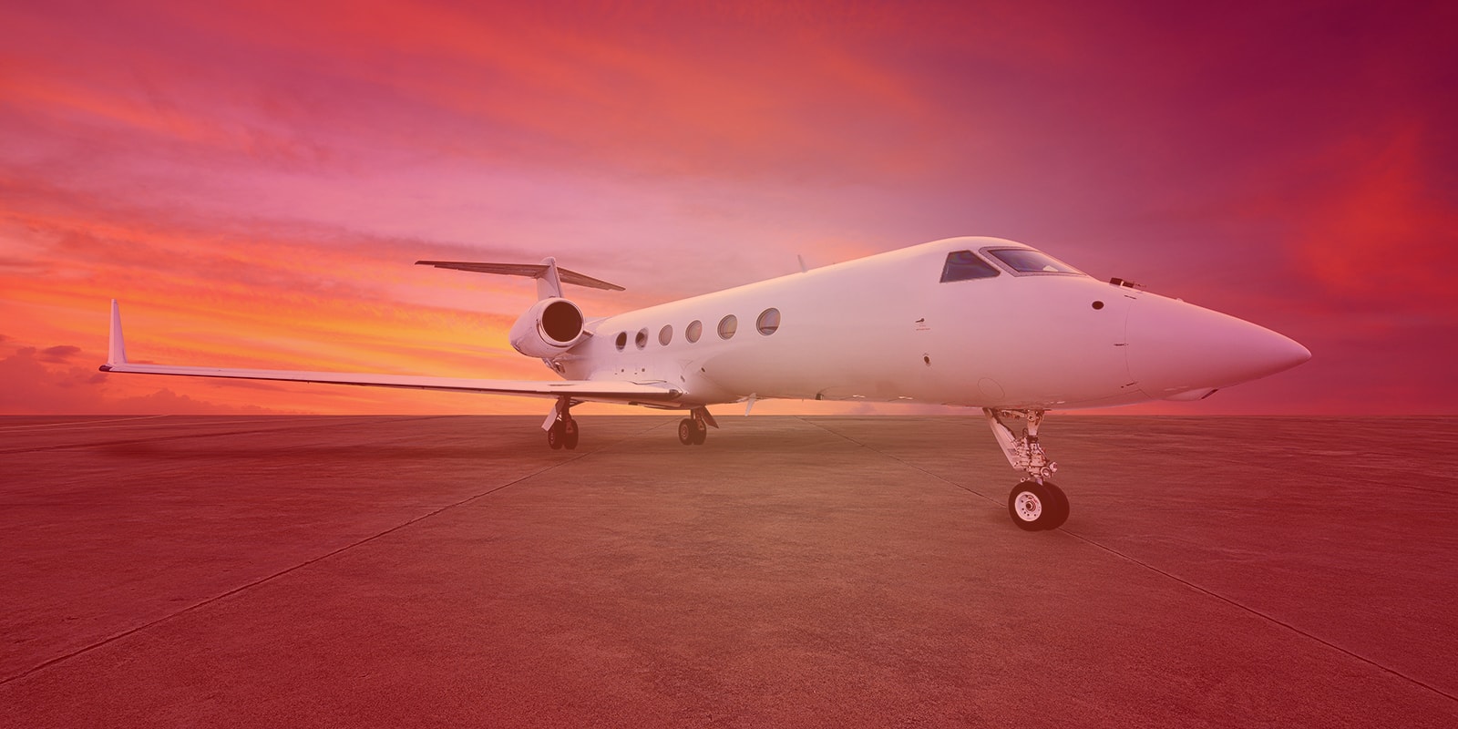 Airplane in sunset